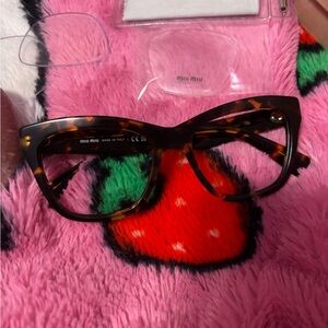 Miu Miu Tortoise Women's Glasses